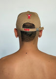 W CAP by Walter van Beirendonck in Camel