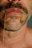 TOILET PAPER NECKLACE by Jonathan Johnson