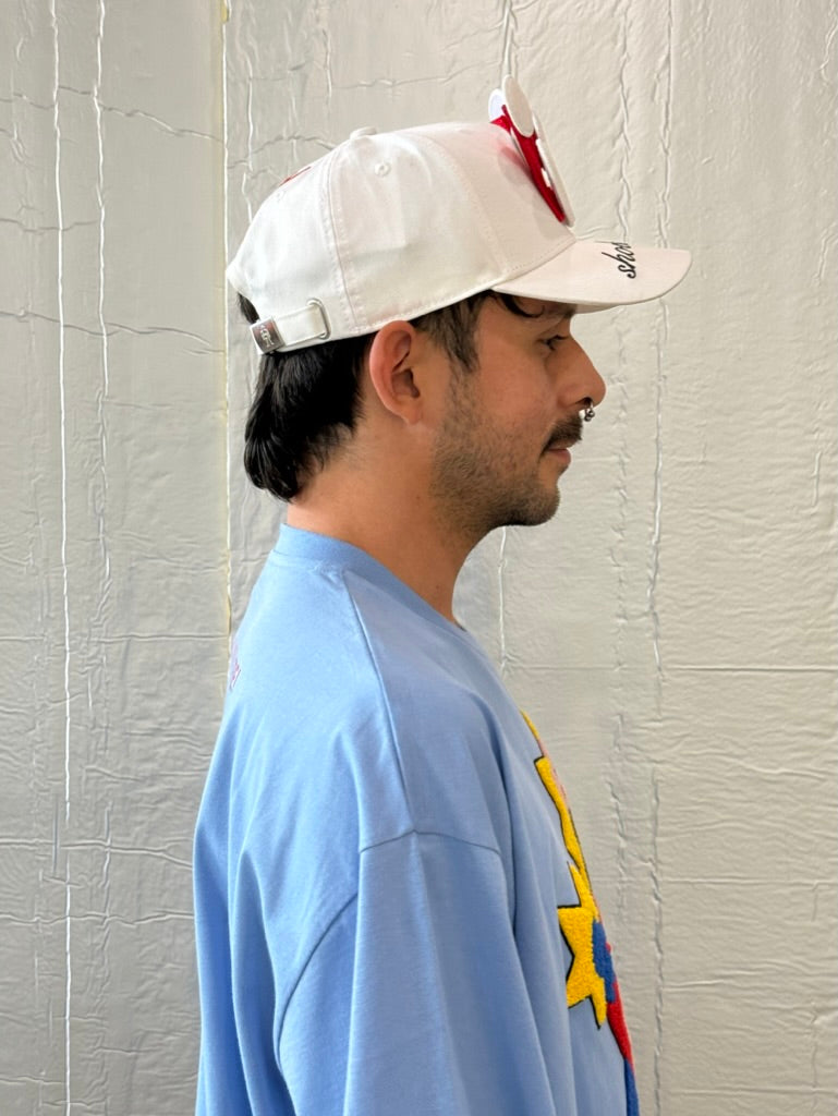 Smiley Cap in White by Walter van Beirendonck