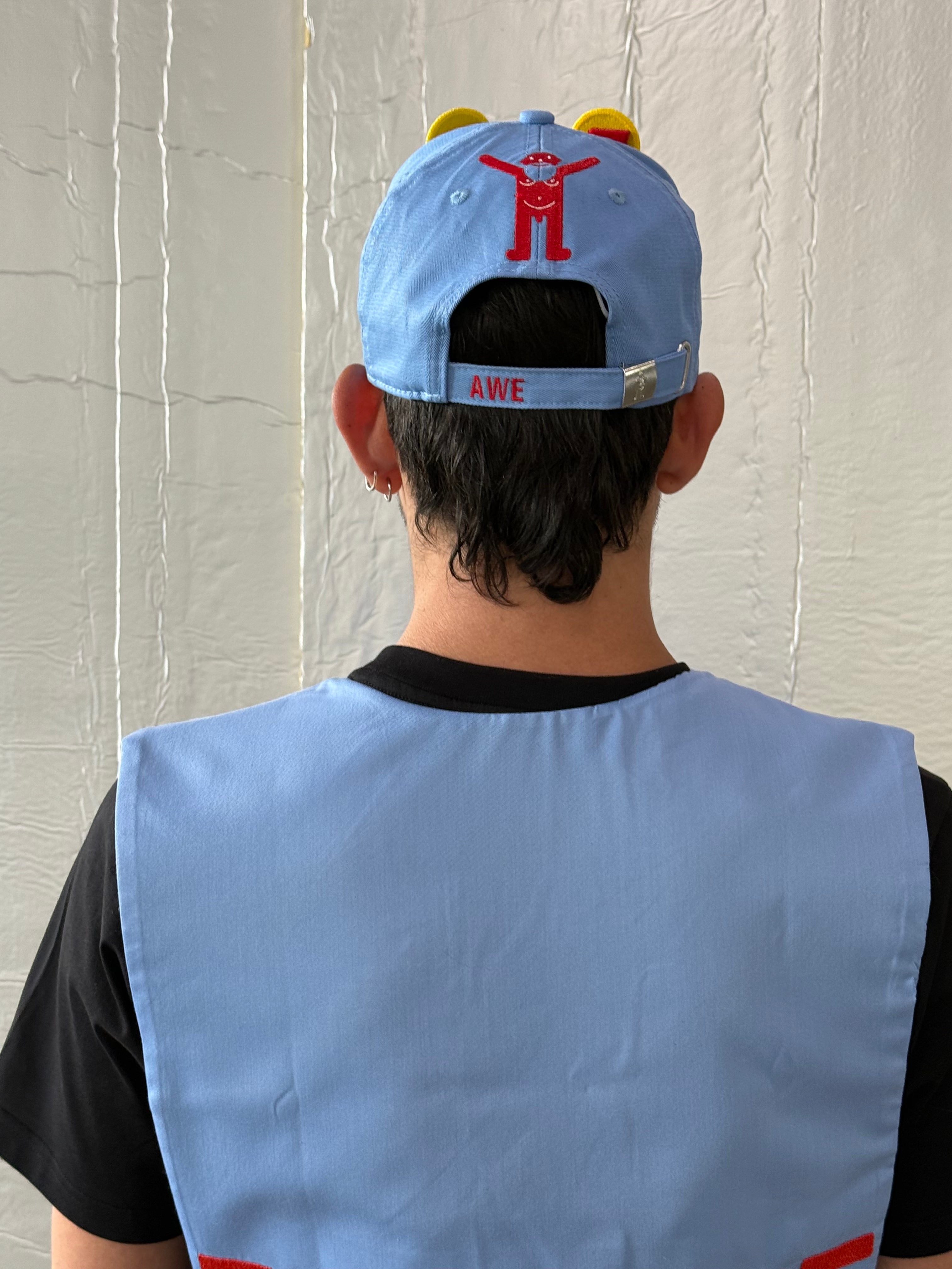 Smiley Cap in Placid Blue by Walter van Beirendonck