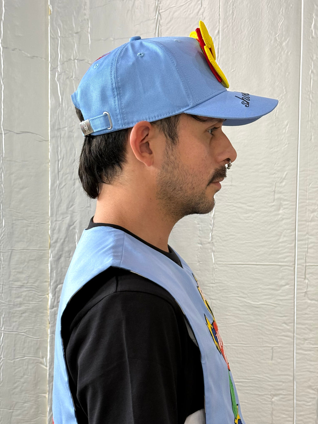 Smiley Cap in Placid Blue by Walter van Beirendonck