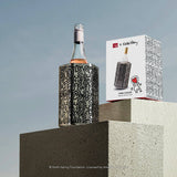 Vacu Vin Keith Haring wine cooler styled with a wine bottle