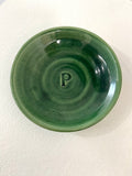 Lot 39: Green ceramic “pharoah dish” made by Adam Lambert