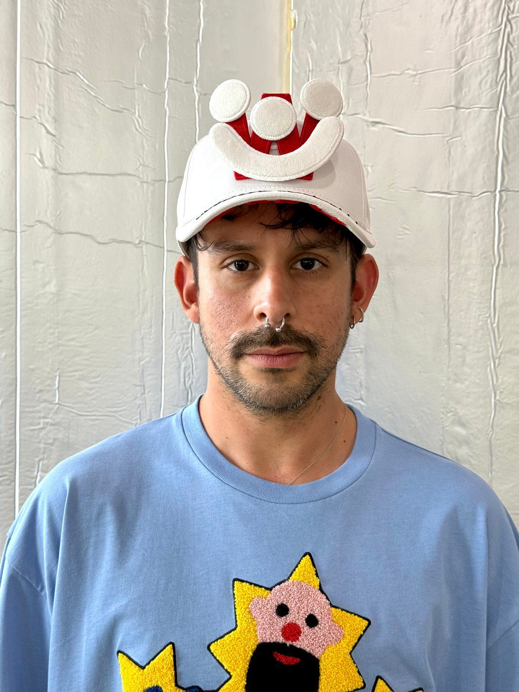 Smiley Cap in White by Walter van Beirendonck