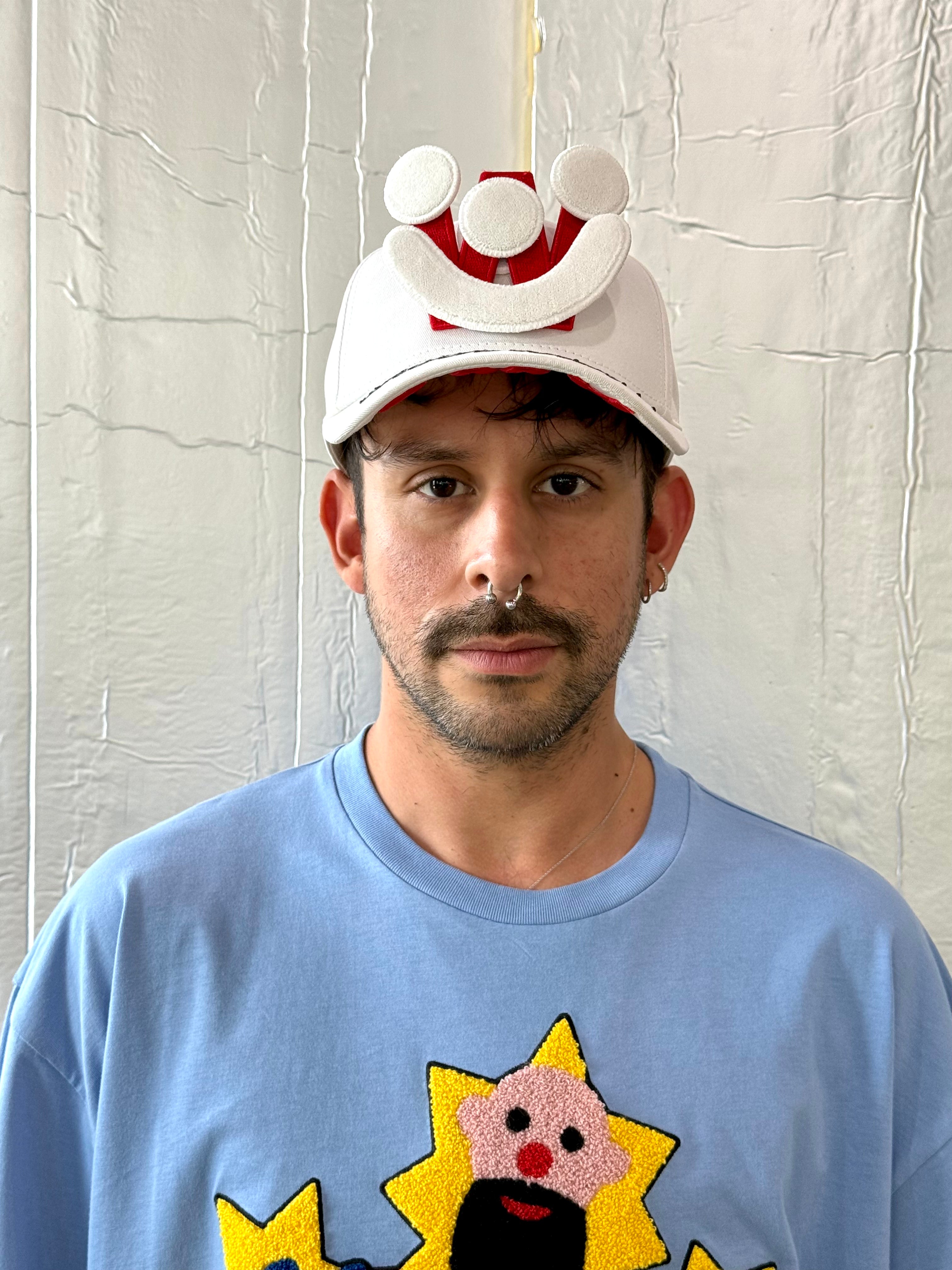 Smiley Cap in White by Walter van Beirendonck
