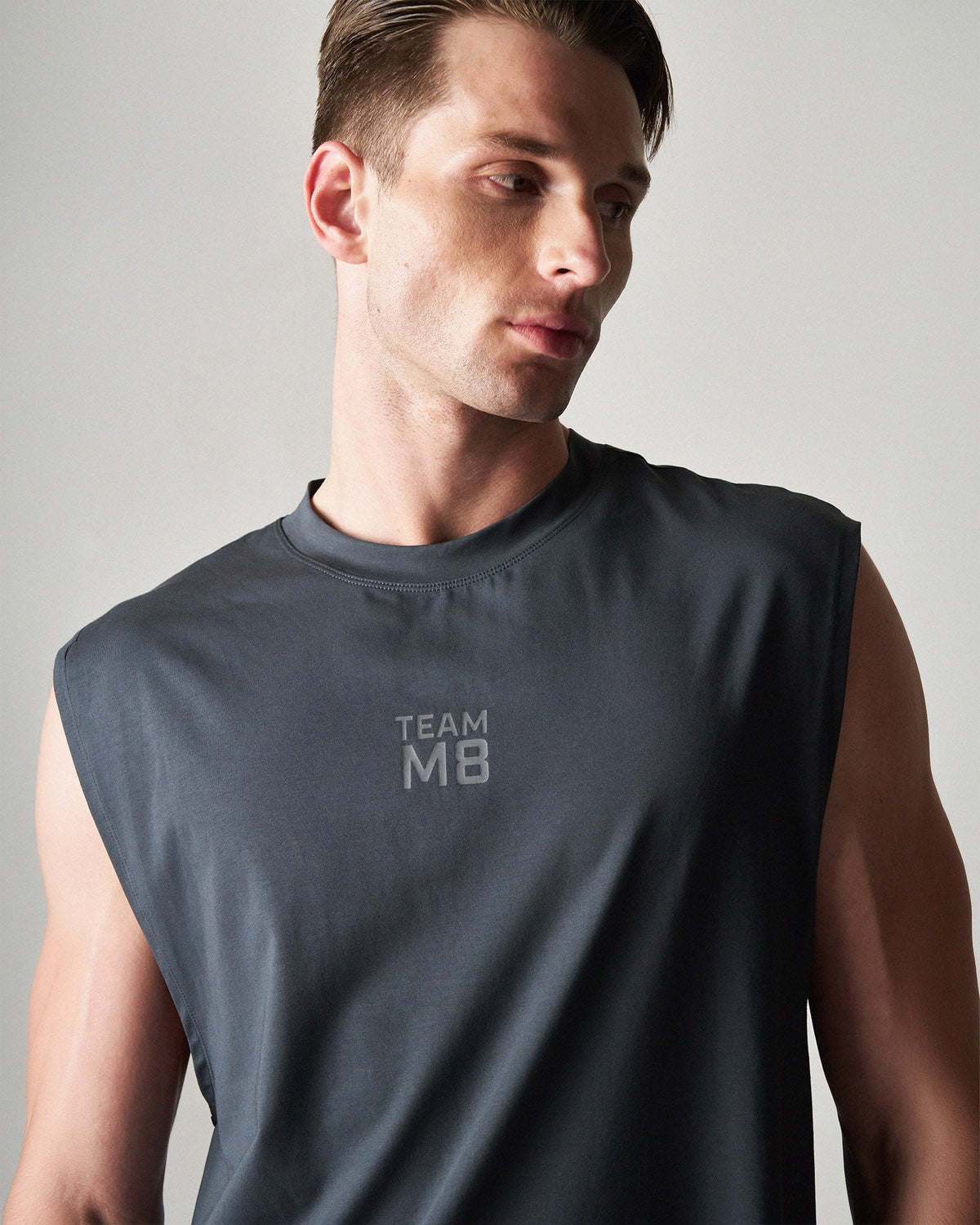 TEAMM8 Strike Box Muscle Tank 2.0. - Gunmetal
