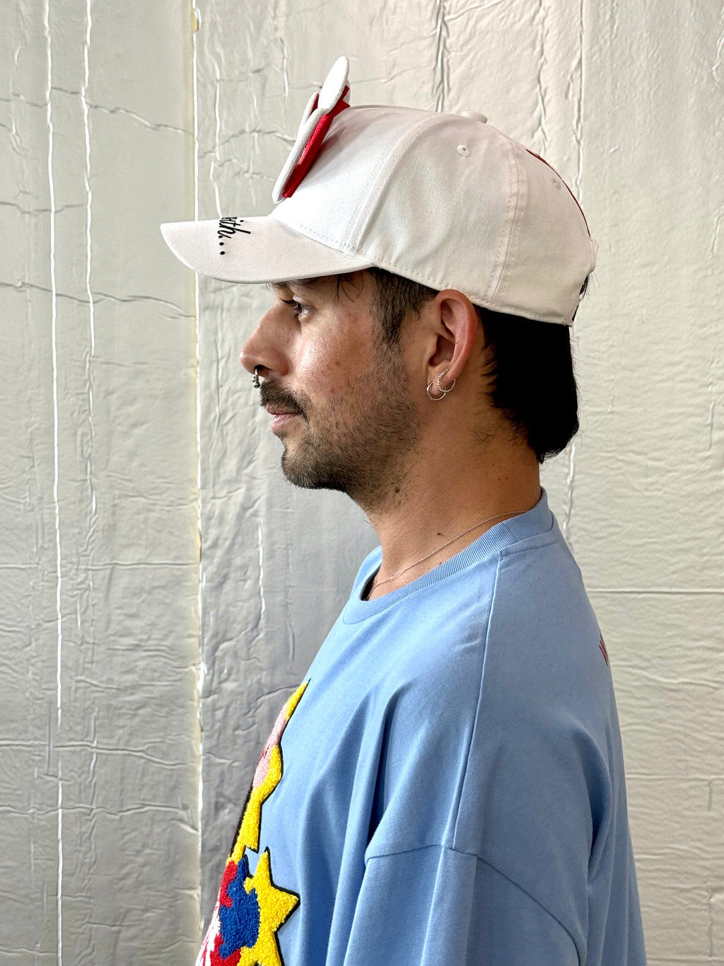 Smiley Cap in White by Walter van Beirendonck