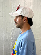 Smiley Cap in White by Walter van Beirendonck