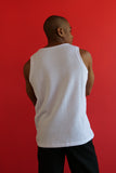 Louis Gabriel Nouchi TANK TOP WITH ASYMMETRICAL OPENING IN TEXTURED COTTON