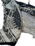 Lot 6: Julien Macdonald / long black stoned, bejeweled and metal fringed jacket with coattails