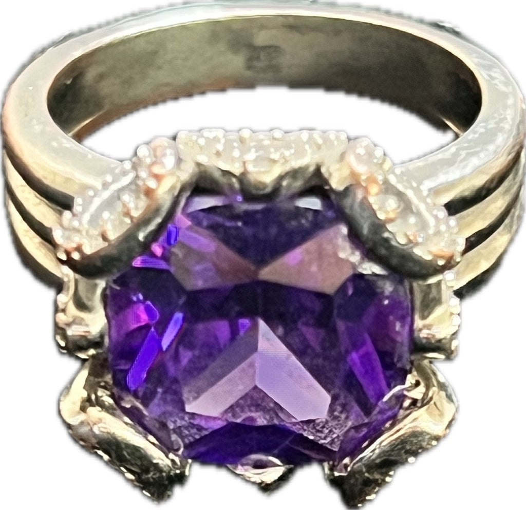 Lot 15: Purple stone pinky ring