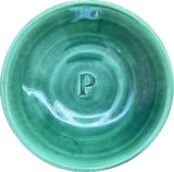 Lot 39: Green ceramic “pharoah dish” made by Adam Lambert