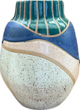 Lot 38: Beige, blue, and green ceramic vessel