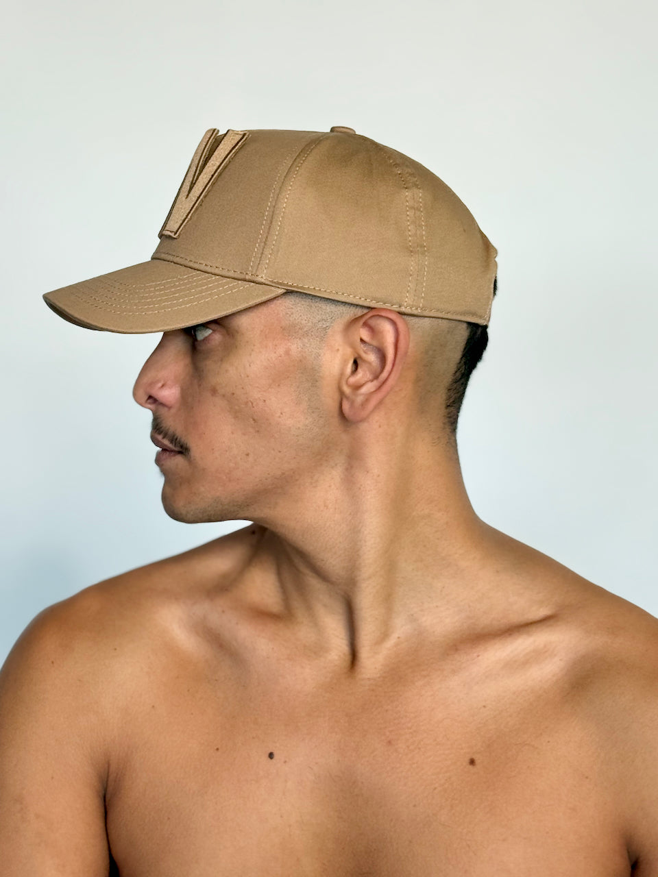W CAP by Walter van Beirendonck in Camel