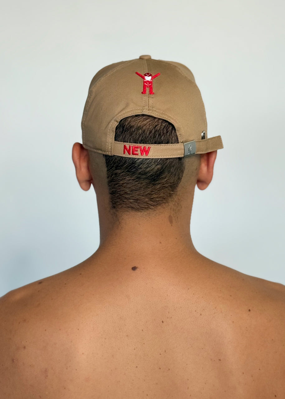W CAP by Walter van Beirendonck in Camel