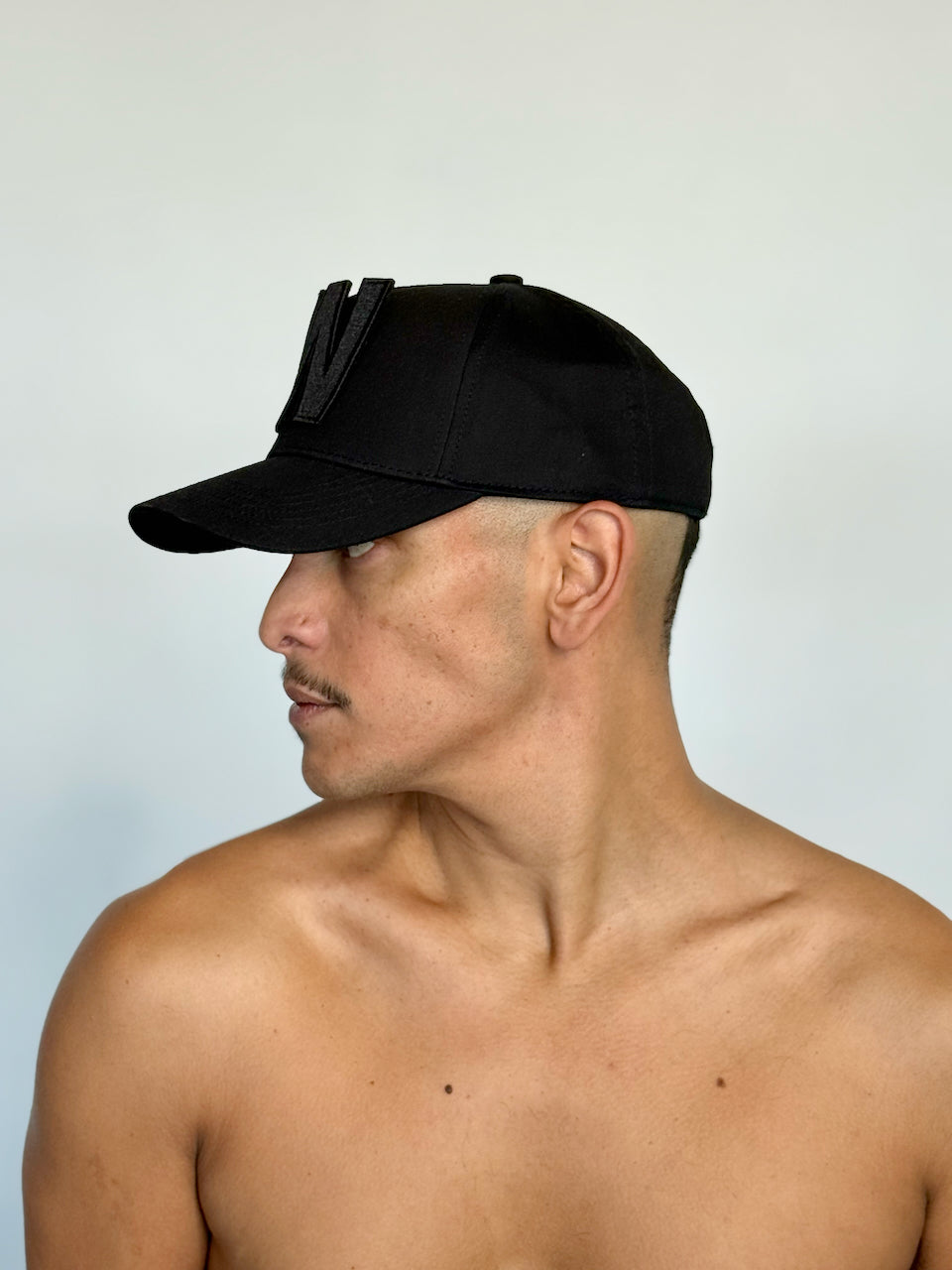 W CAP by Walter van Beirendonck in Black