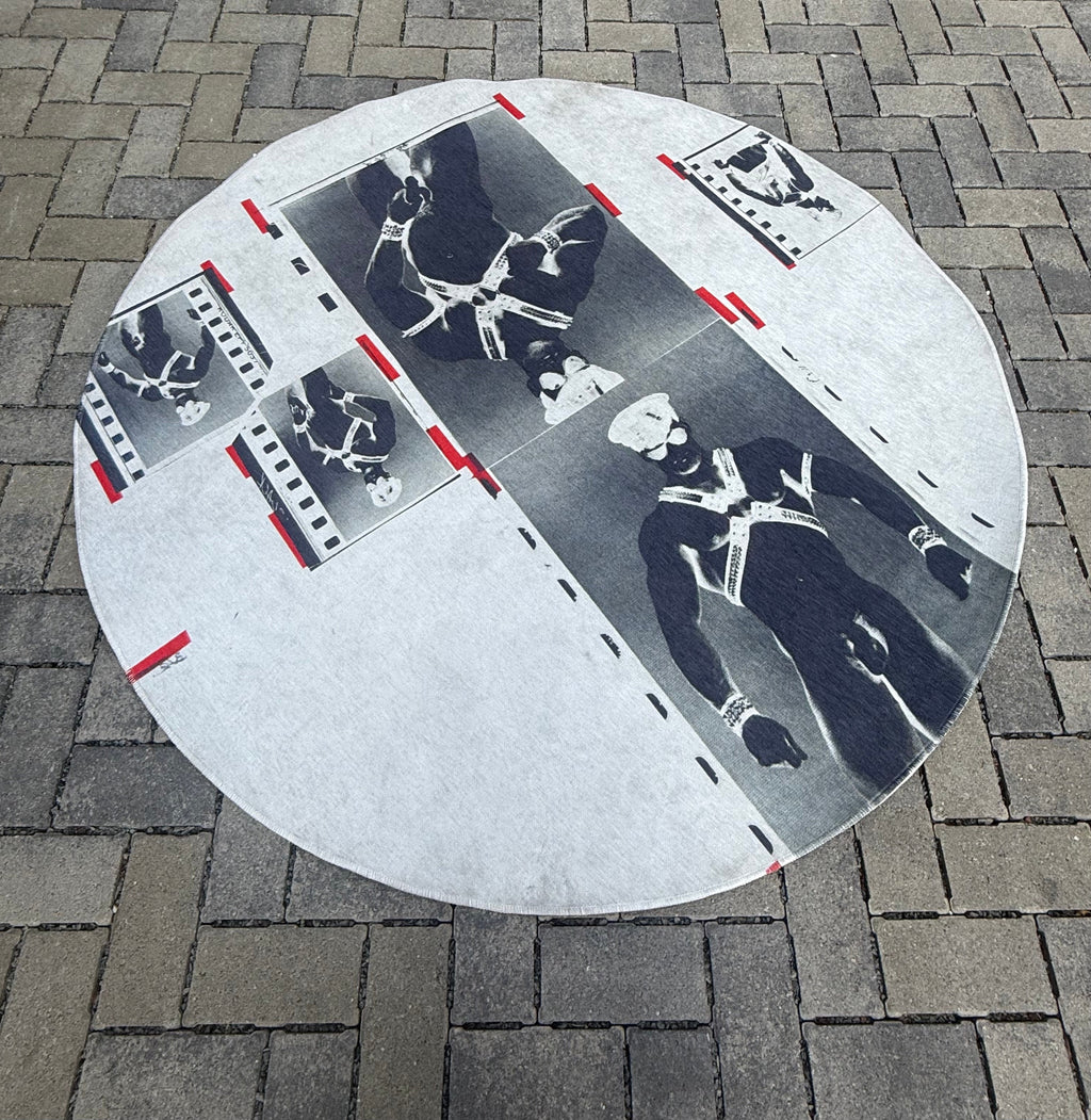 Round woven rug reproducing a vintage magazine layout transparency with red register marks and film edges