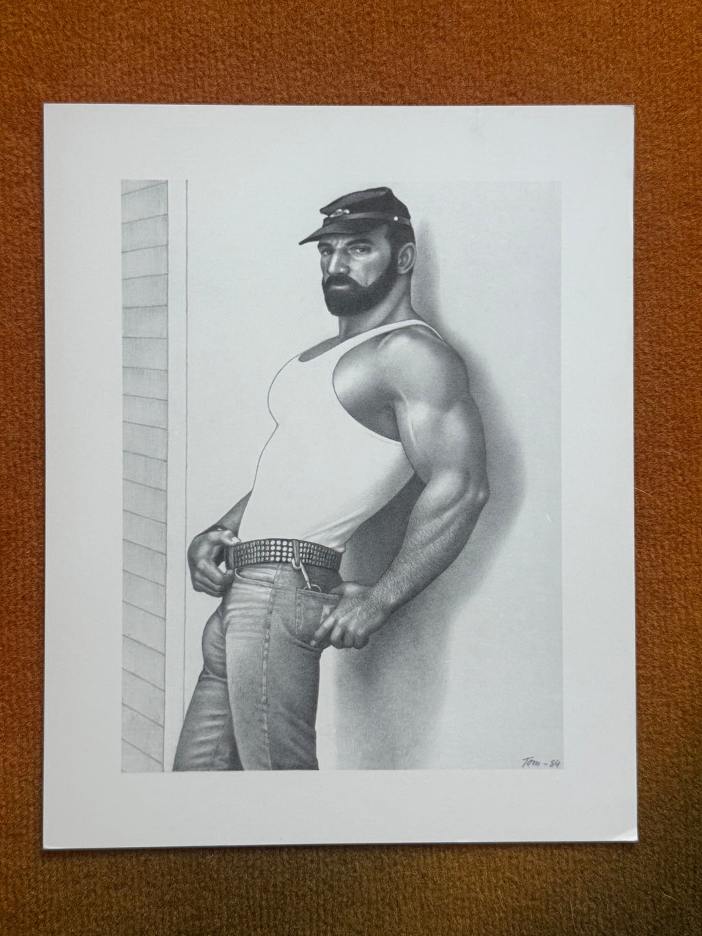 Tom of Finland, leatherman in cap and white tank, print dated Tom-84