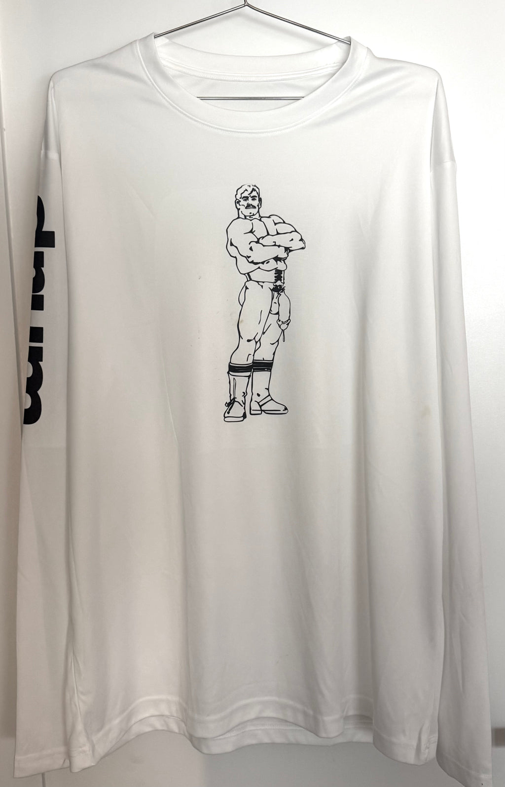 White long-sleeve prototype T-shirt with a Bill Ward figure drawing printed at the chest