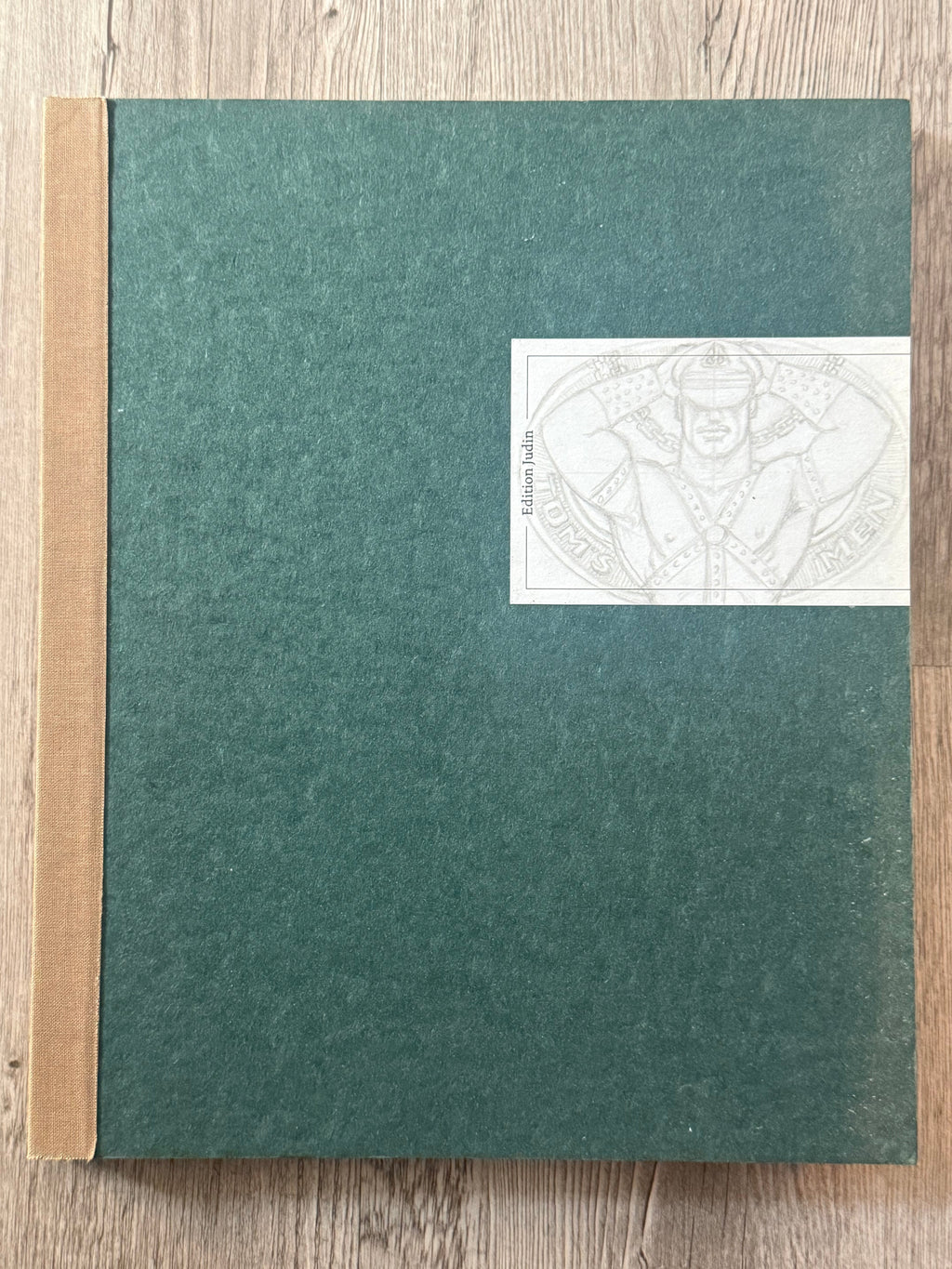 Tom of Finland Galerie Judin catalogue, green board cover with printed paper band