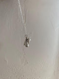 winged Penis Charm Necklace in silver by Gilty Boy