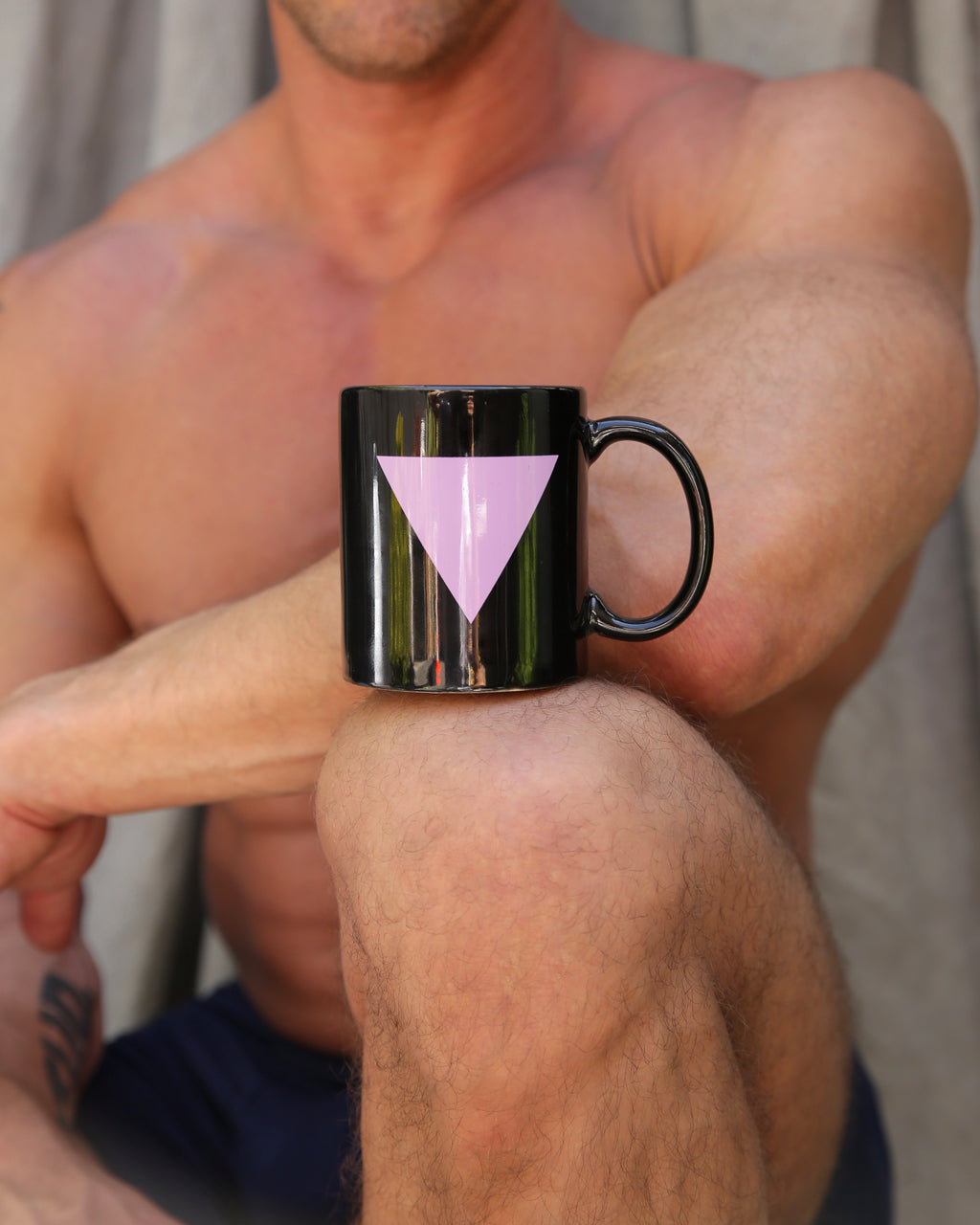 Pink triangle mug in black