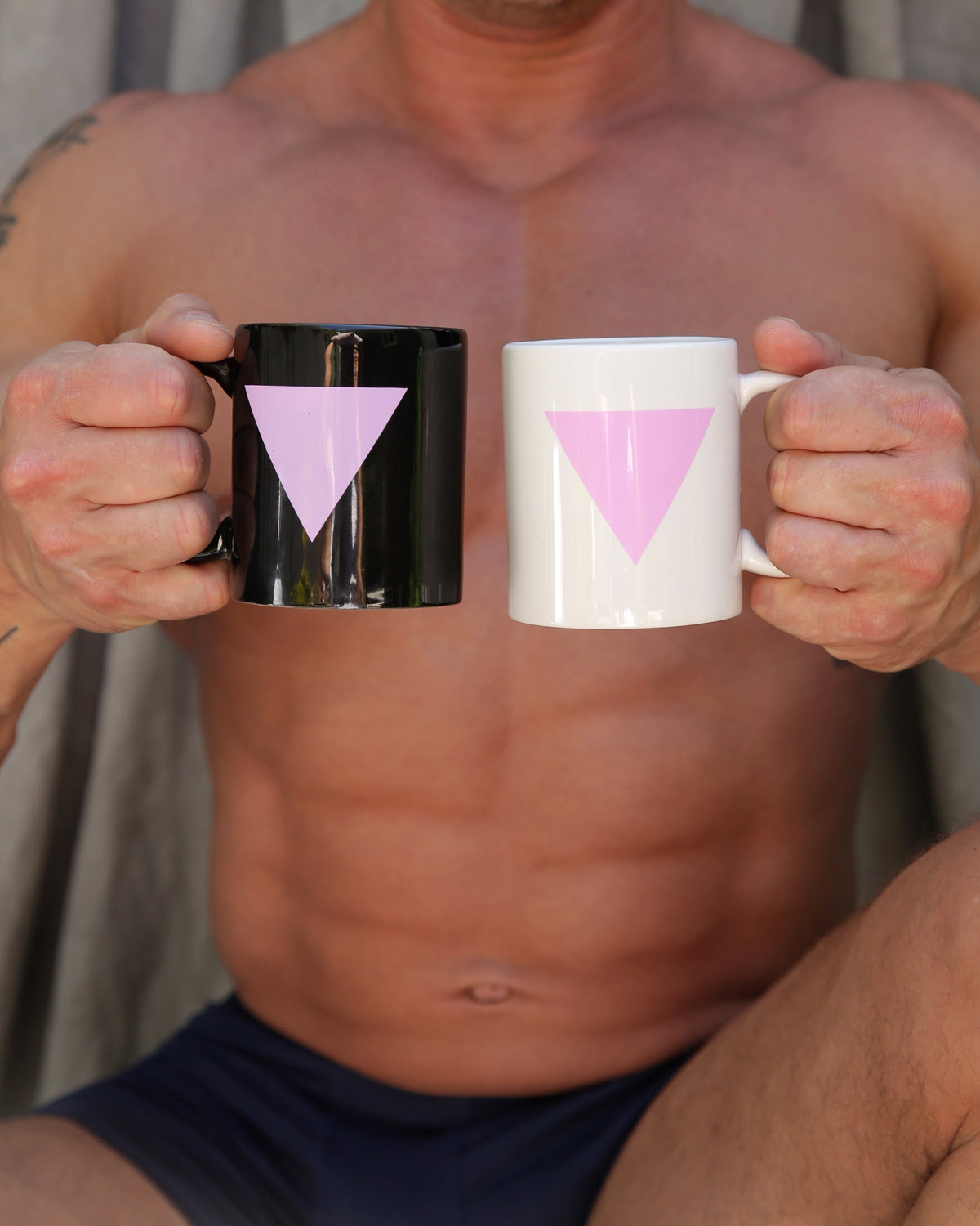 Pink triangle mug in black