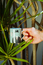 MAGRITTE PORCELAIN MUG LE PÈLERIN BLUE