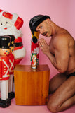 Tom of Finland Christmas Candle by Peachy Kings