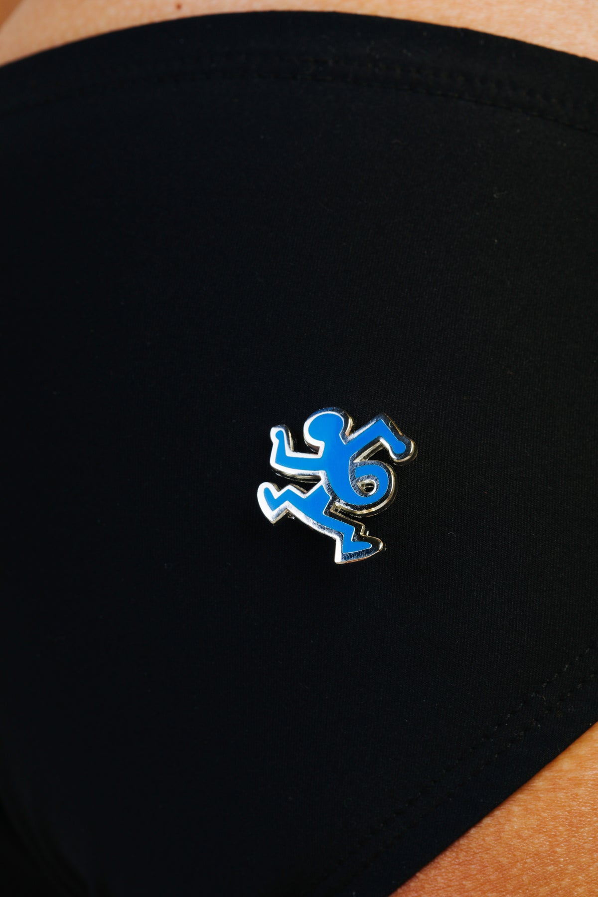 KEITH HARING TWIST MAN PIN - BLUE