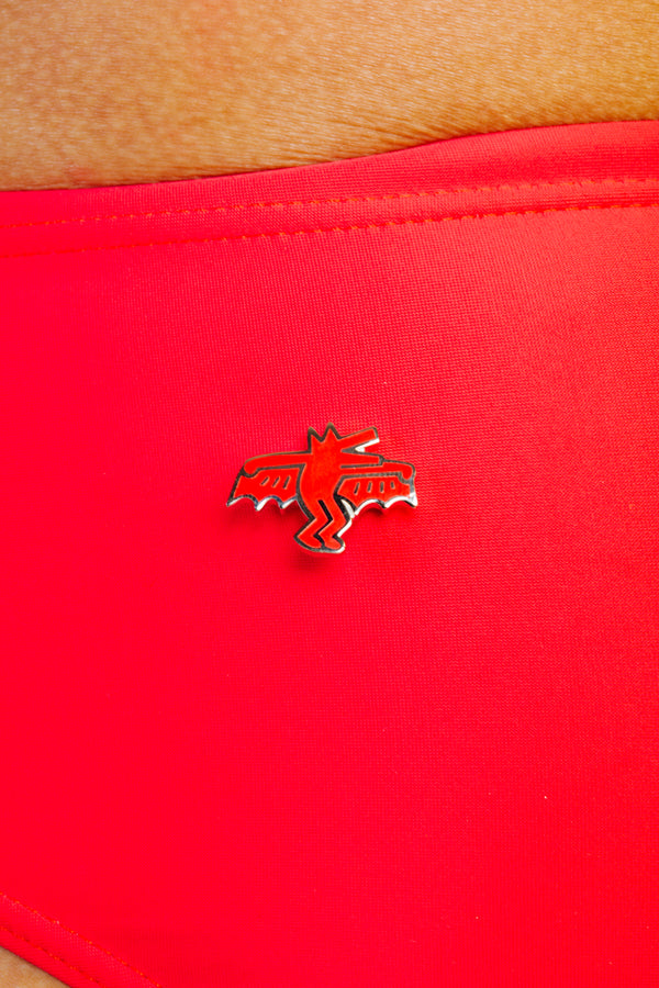 KEITH HARING BAT DOG PIN - RED