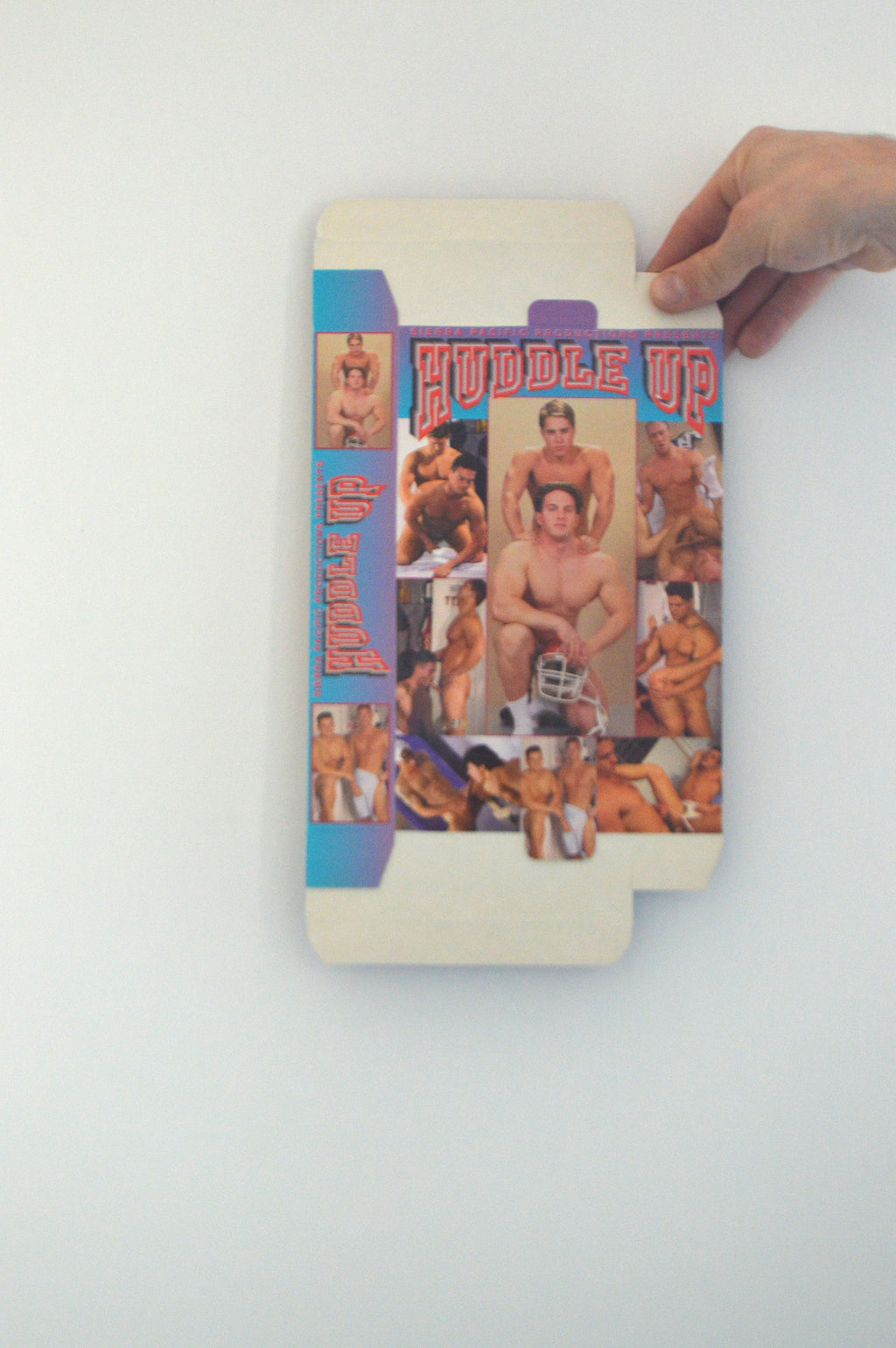 "HUDDLE UP" VINTAGE VHS COVER