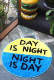Day is Night / Night is Day Shaggy Floor Mat - Third Drawer Down X David Shrigley