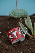 Keith Haring Porcelain tea cup & plate - White on Red